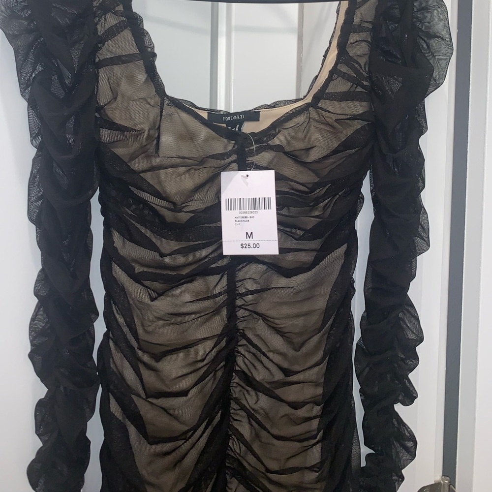 Black/nude knit dress